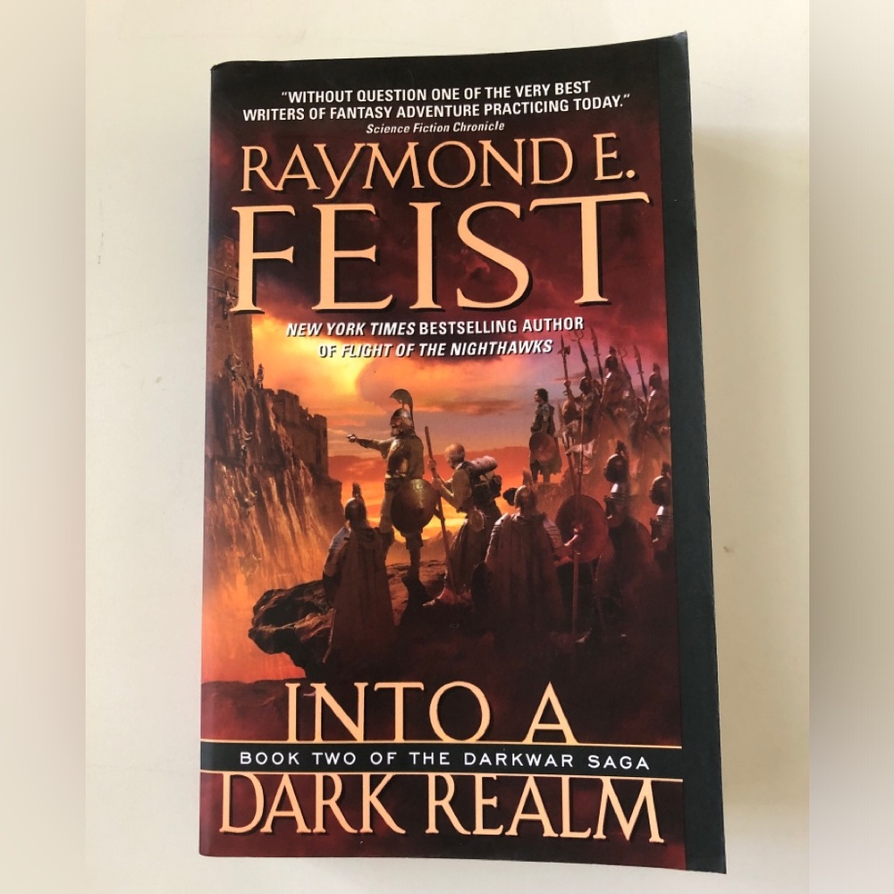 Into a Dark Realm - Book 2 of Darkwar Saga paperback book by Raymond E Feist